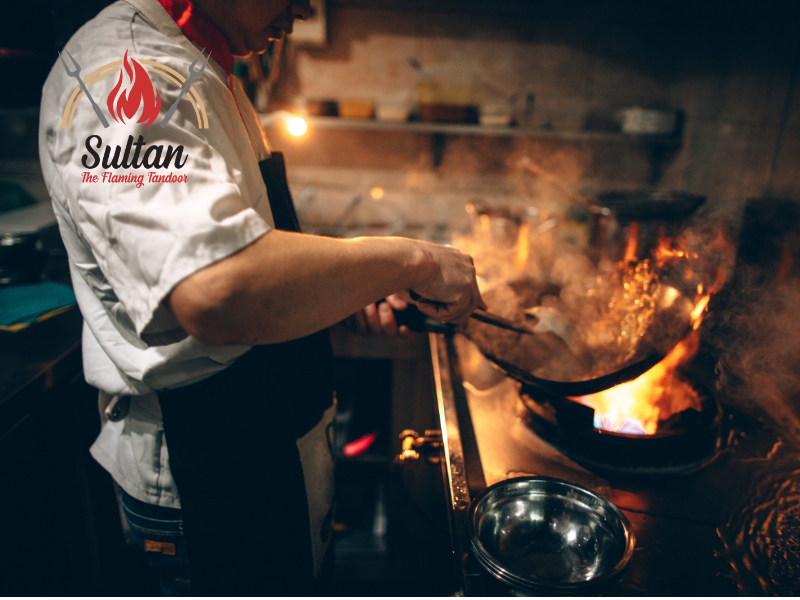Expert chef preparing a traditional Pakistani dish